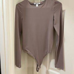 5/$20 Purplish/gray body suit.